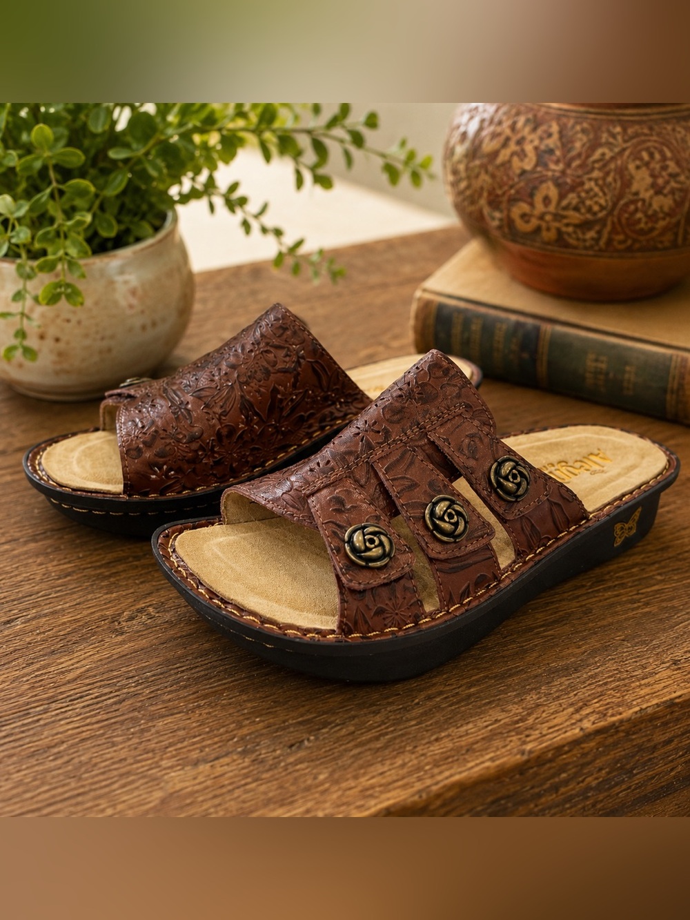 Alegria Brown Embossed Leather Slide Mules with Decorative Rose Buttons